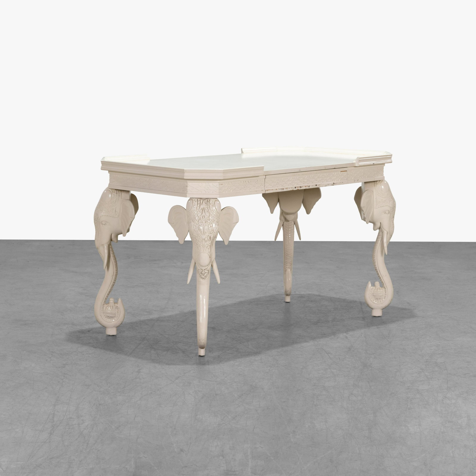 Gampel Stoll - Elephant Console: A white lacquered console by Gampel Stoll with elephant form legs. 31.5 x 55 x 29.5. All measurements are in inches.
