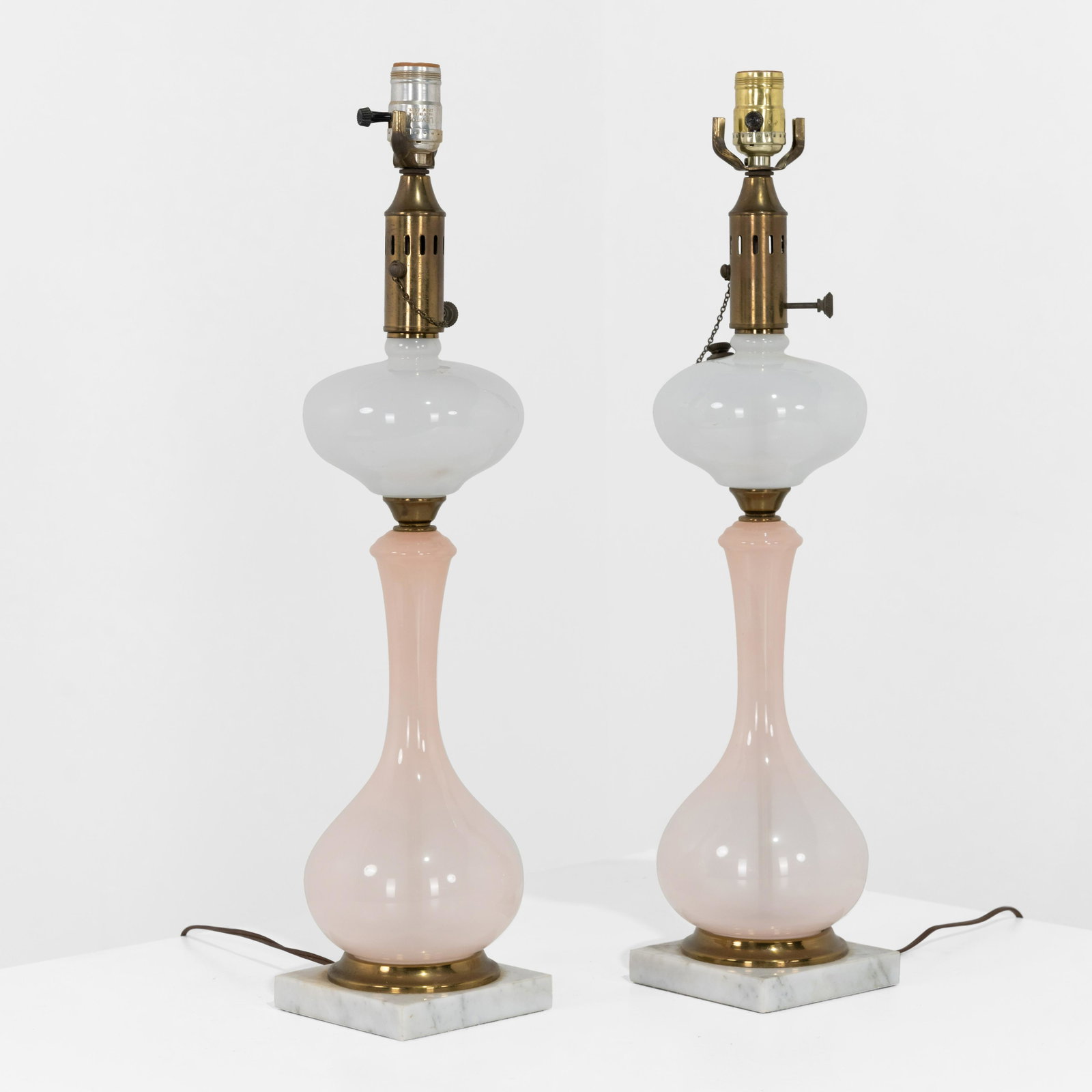 Glass Oil Lamps: A pair of glass and marble converted oil lamps. 24 x 5 x 5. Measurements are in inches. (Height x Width x Depth)