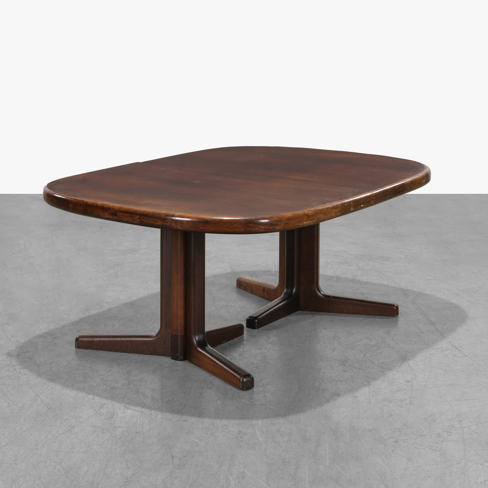 Danish Rosewood Dining Table: A vintage Danish rosewood dining table with four 23.75" leaves. No leaves - 28.5 x 70 x 51.5. Measurements are in inches. (Height x Width x Depth)