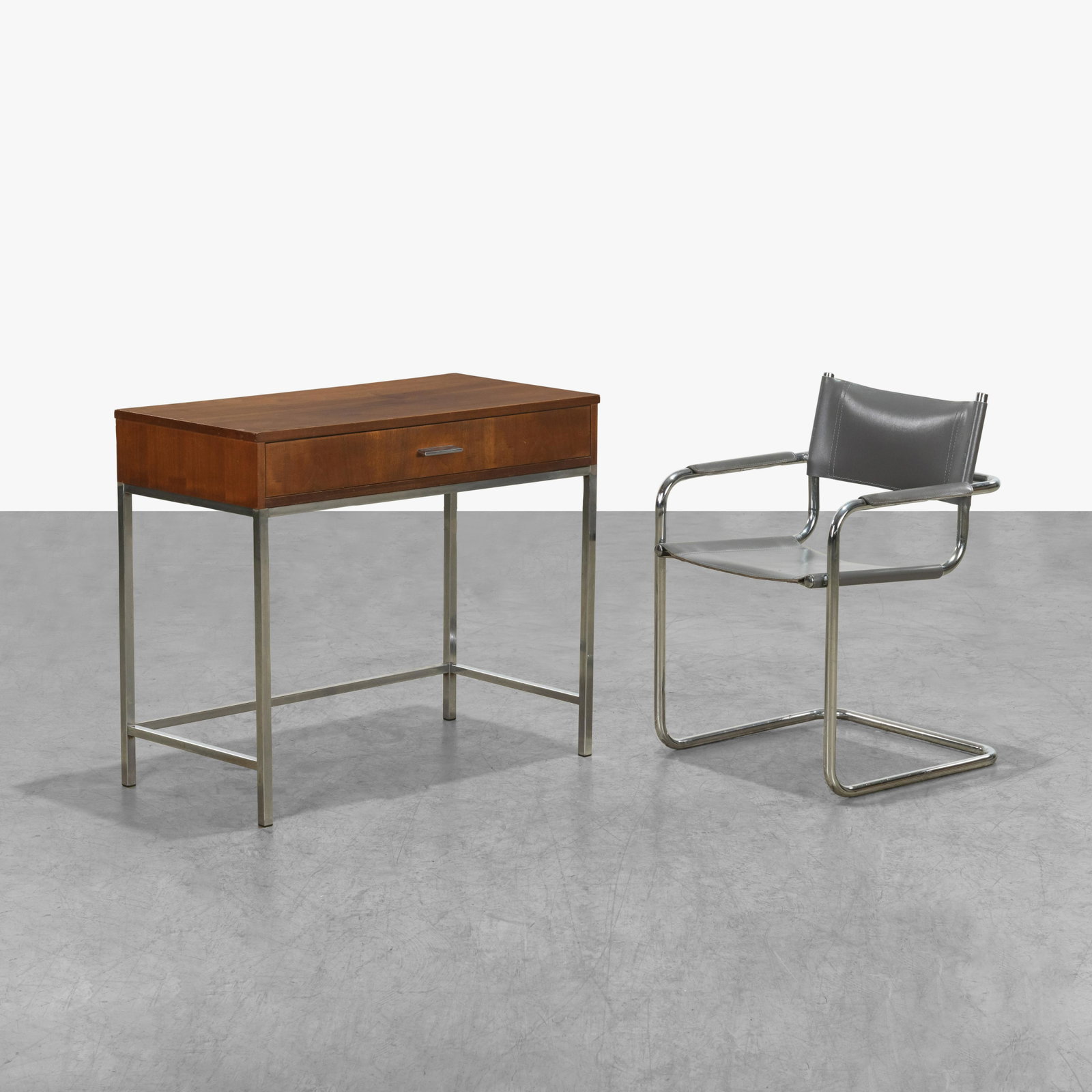 Desk & Chair: A vintage desk by Dixie on chrome legs with a Mart Stam arm chair. Chair does not fit under desk entirely. Desk - 31 x 36 x 18.5 / Chair - 30 x 23.5 x 20.5 . Measurements are in inches. (Height x Widt