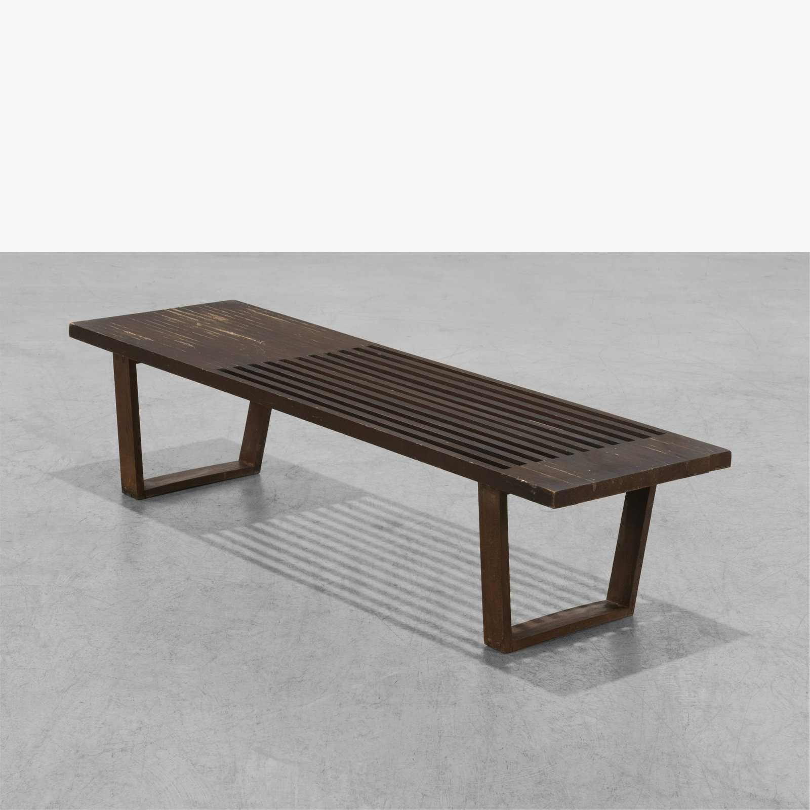 Slat Bench: A vintage, 'slat' style bench. In the manner of George Nelson. 13.5 x 60 x 17.5. Measurements are in inches. (Height x Width x Depth)