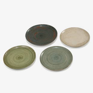 Lee Rosen - Stoneware Plates: Four large stoneware plates by Lee Rosen for Design-Technics. Three of similar size and one larger. Stamped on bottom. Largest - 11.25" . Measurements are in inches. (Height x Width x Depth)