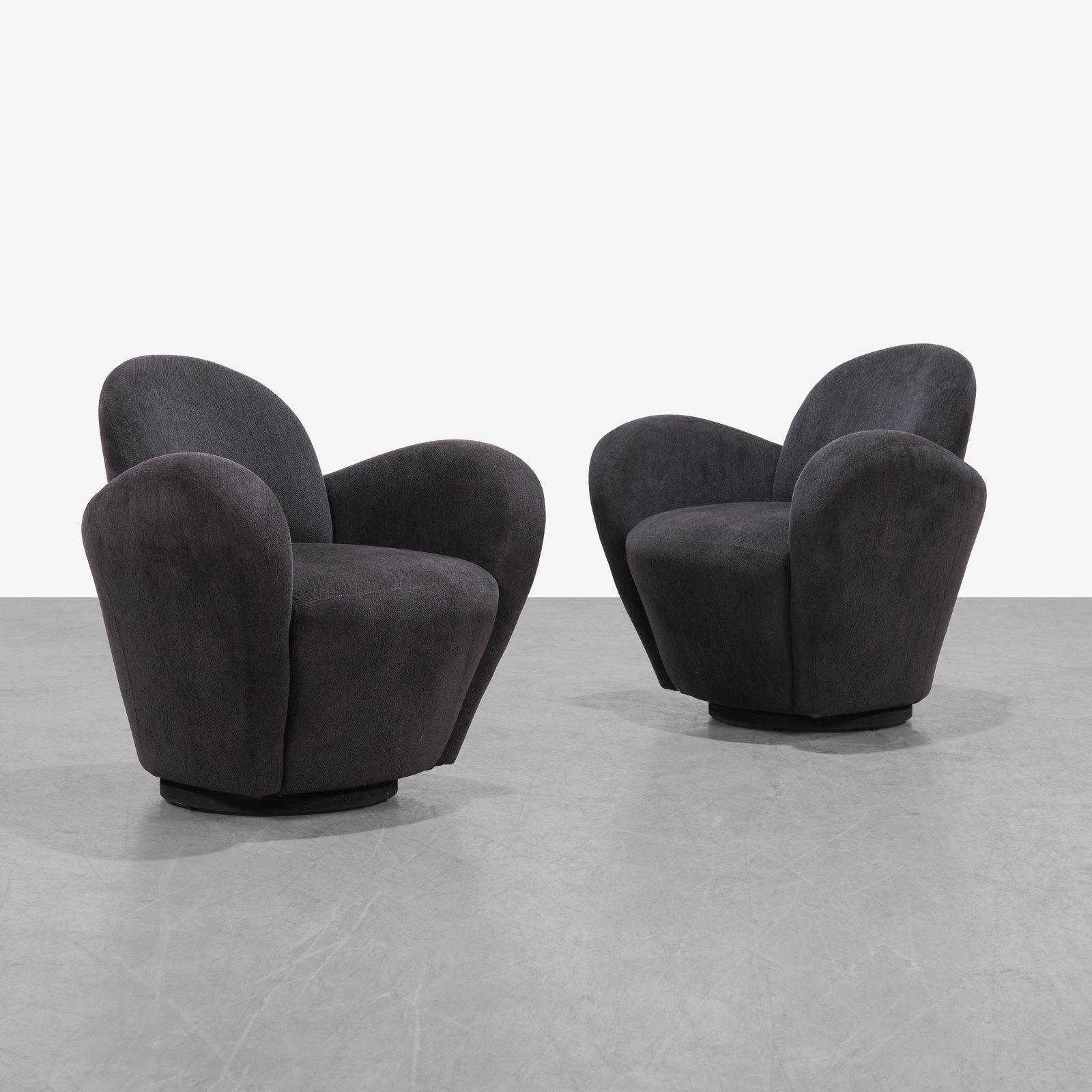 Michael Wolk - Club Chairs: A pair of 'Miami' swiveling club chairs by Michael Wolk. 32.5 x 35 x 28 . Measurements are in inches. (Height x Width x Depth)