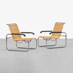 Marcel Breuer - B35 Lounge Chairs: A pair of vintage B35 lounge chairs with paddle arms by Marcel Breuer for Thonet/ ICF. 33 x 25.5 x 31.5. Measurements are in inches. (Height x Width x Depth)