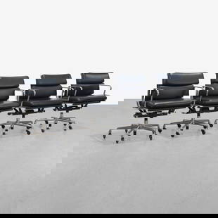 Charles & Ray Eames - Softpad Chairs: A set of four leather 'Softpad' chairs by Charles and Ray Eames for Herman Miller. 32 x 23 x 26. Measurements are in inches. (Height x Width x Depth)