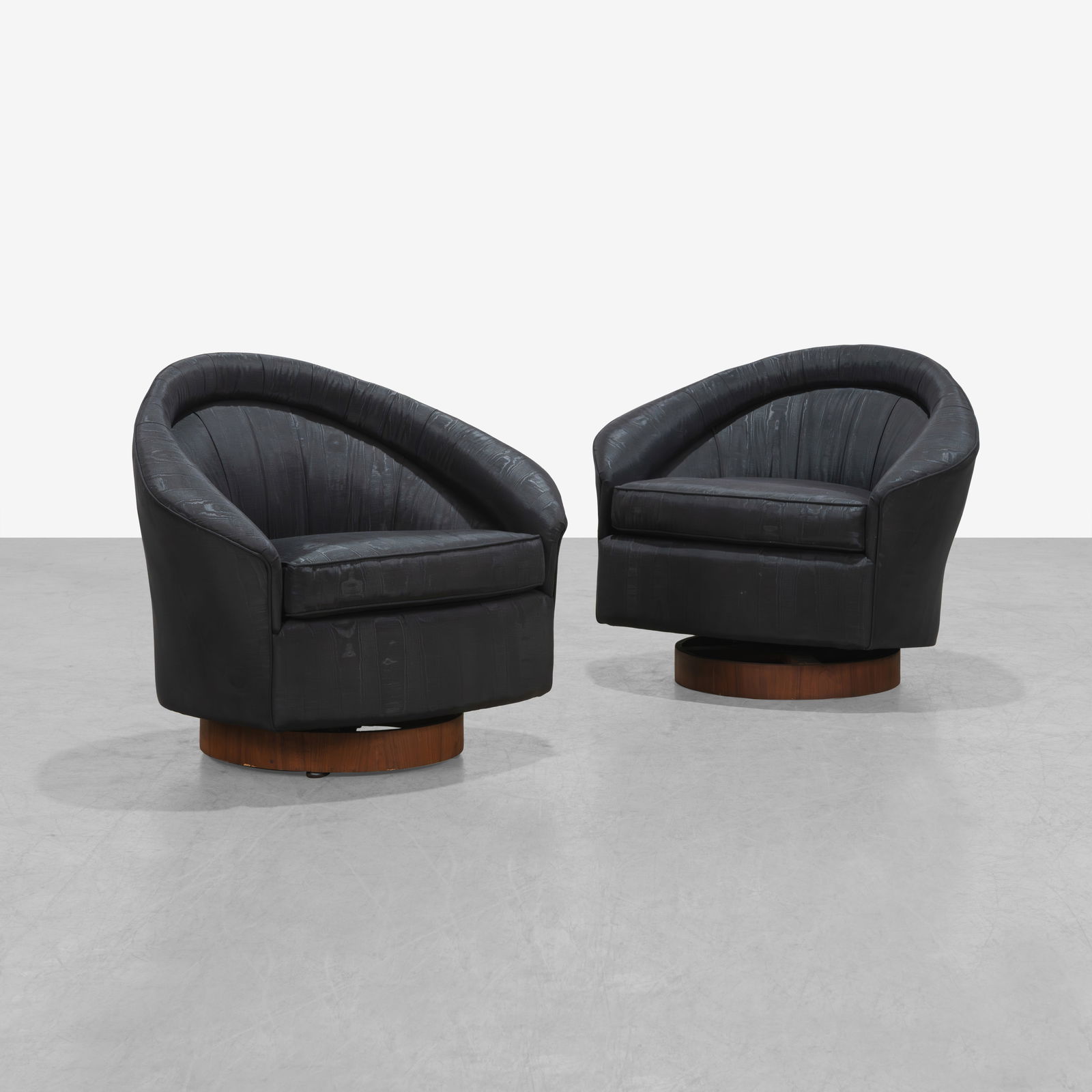 Adrian Pearsall - Tilt & Swivel Lounge Chairs: A pair of vintage 'tilt and swivel' lounge chairs on walnut pedestal bases by Adrian Pearsall for Craft Associates. 30 x 38 x 24. Measurements are in inches. (Height x Width x Depth)