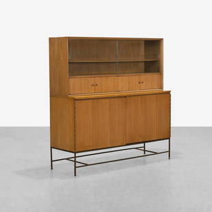 Paul McCobb - Credenza: A two part credenza / china cabinet by Paul McCobb for Calvin. Credenza - 35 x 60.5 x 19.5 / Hutch - 26.5 x 60.5 x 14 . Measurements are in inches. (Height x Width x Depth)