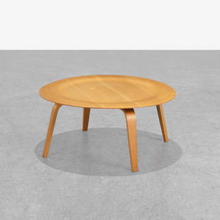 Charles & Ray Eames - CTW: A molded plywood, CTW-3, coffee table by Charles and Ray Eames for Herman Miller. Newer production. 16 x 34. Measurements are in inches. (Height x Width x Depth)