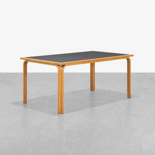 Thygesen & Sorensen - Table: A vintage table by Rud Thygesen and Johnny Sorensen for Magnus Olesen. Bent birch frame and inset Formica top. Could be paired with the matching table to form one large table. 27.5 x 61 x 35.5. Measur