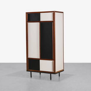 Andre Sornay - Wardrobe: A vintage wardrobe by Andre Sornay with black and white sliding doors. One side contains a hanging wardrobe bar, with a shoe rack underneath. 79.5 x 41 x 24. Measurements are in inches. (Height x Widt