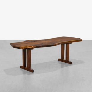 George Nakashima (Attr.) - Walnut Coffee Table: A vintage walnut coffee table with four inlaid rosewood butterflies, attributed to George Nakashima. Unmarked. 22 x 71 x 30. Measurements are in inches. (Height x Width x Depth)