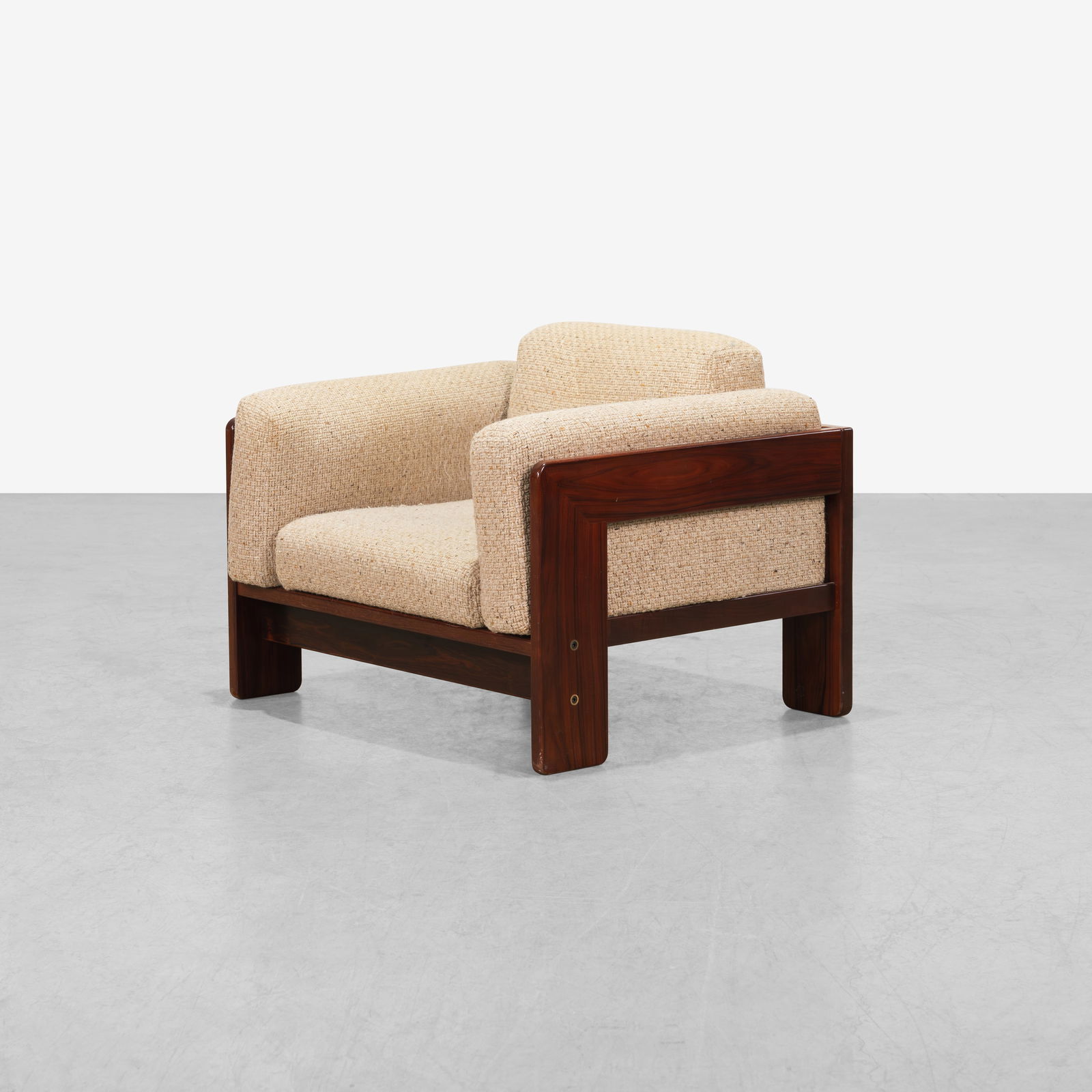 Tobia Scarpa - Bastiano Lounge Chair: A vintage rosewood 'Bastiano' club chair by Tobia Scarpa for Knoll. 28 x 37 x 30.5. Measurements are in inches. (Height x Width x Depth)