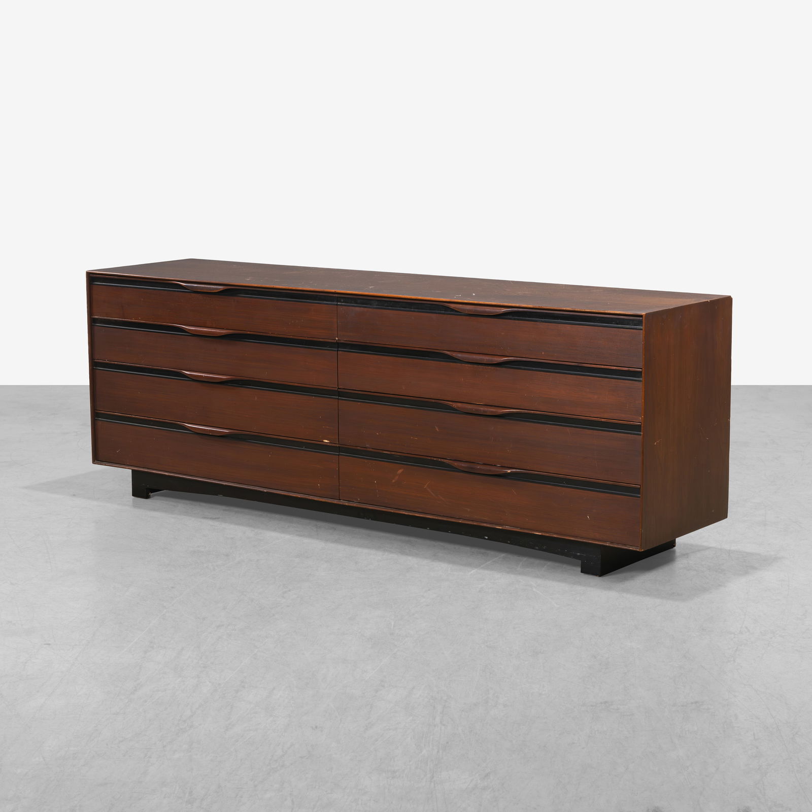 John Kapel - Dresser: A walnut dresser by John Kapel for Glenn of California. 28.5 x 83.5 x 20. All measurements are in inches. (Height x Width x Depth).