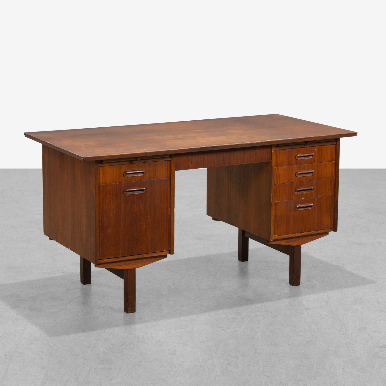 Teak Desk: A vintage teak desk. 29 x 55.25 x 27.5. All measurements are in inches. (Height x Width x Depth).