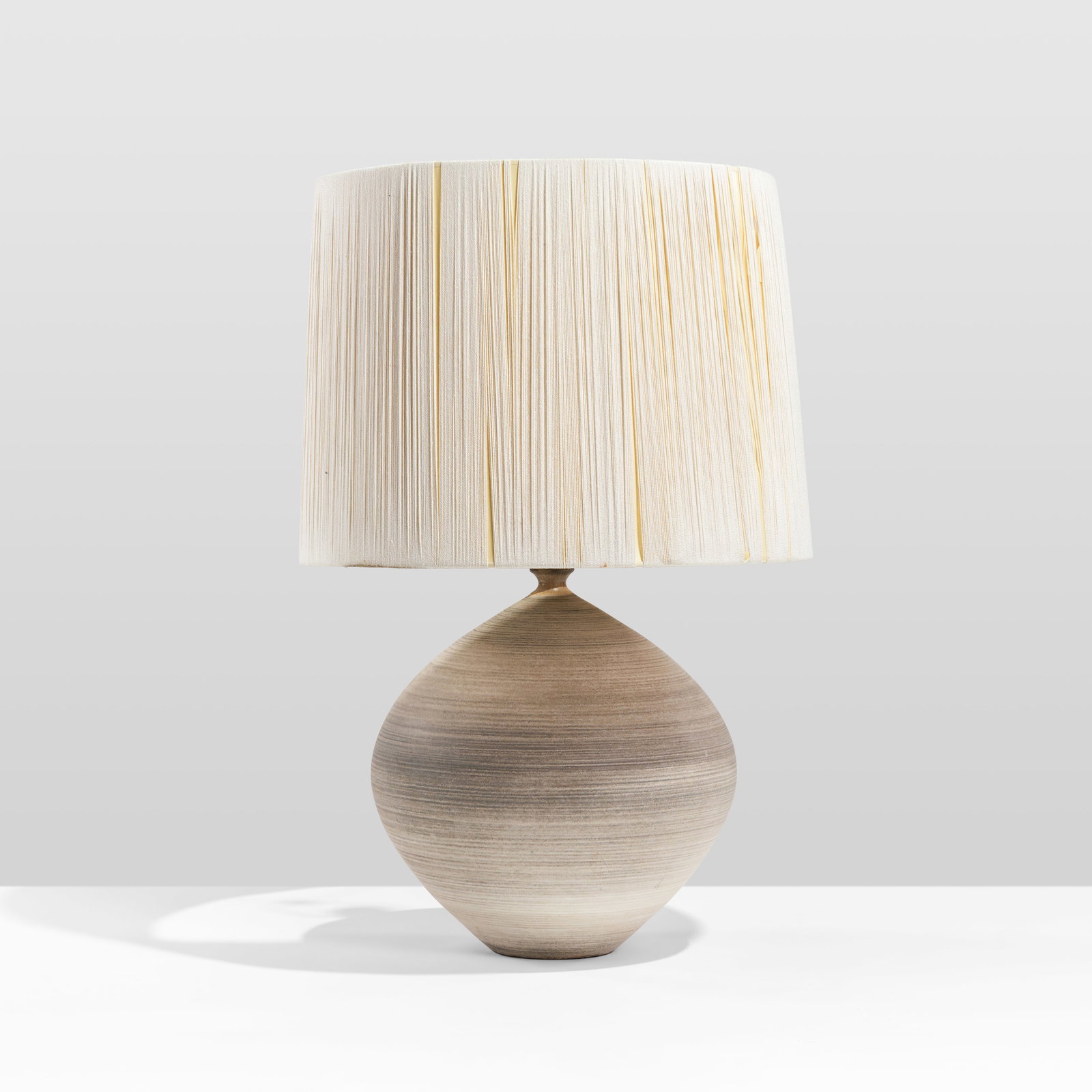 Lee Rosen - Large Pottery Table Lamp: A large pottery table lamp by Lee Rosen for Design Technics. Embossed stamp near cord outlet. Shade - 15 x 18