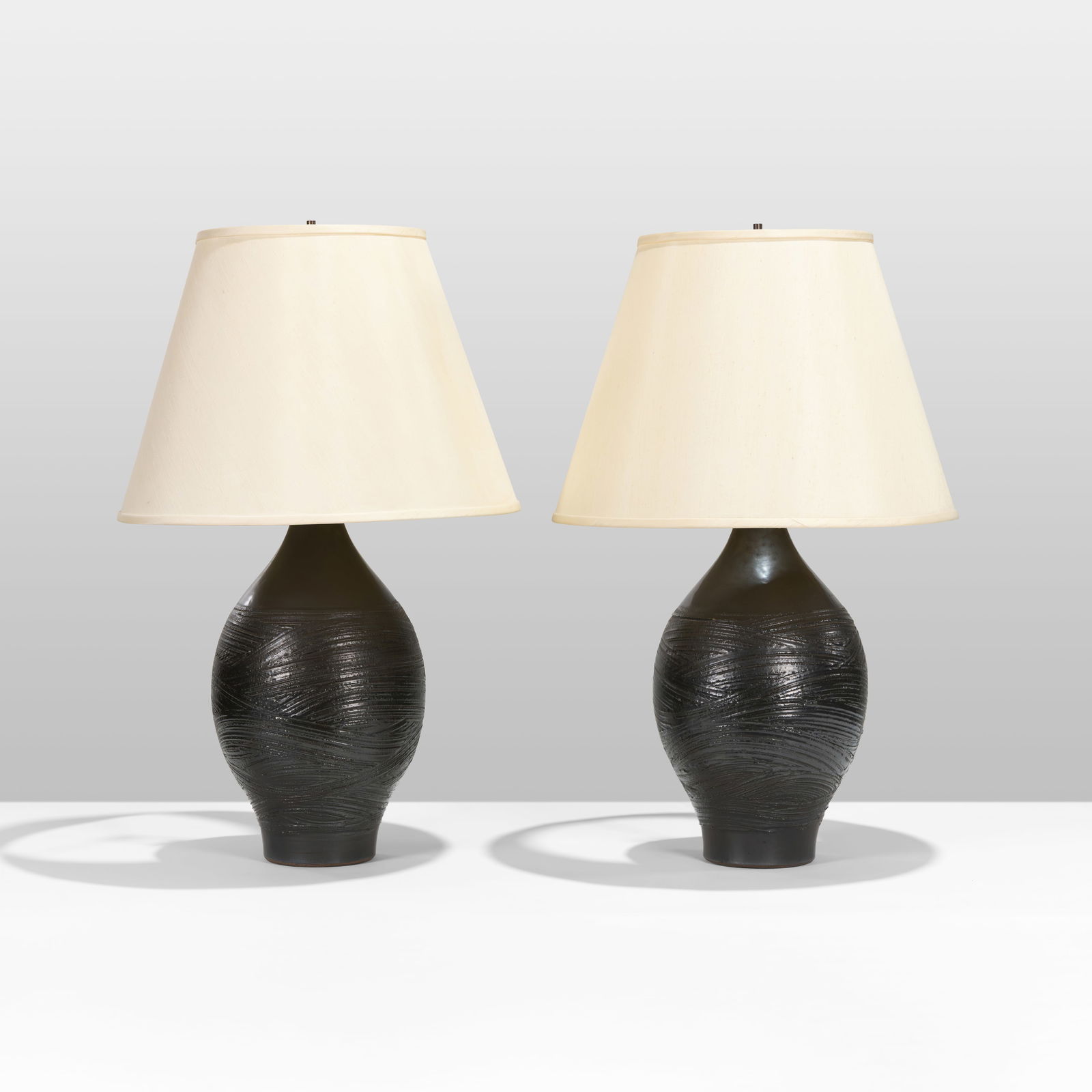 Lee Rosen - Pottery Lamps: A pair of large pottery lamps by Lee Rosen for Design Technics. Measurement is without shades. Pottery base - 20 x 12.