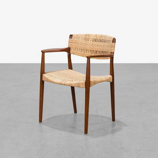 Larsen & Aksel Bender Madsen - Armchair: A teak and cane armchair by Ejnar Larsen and Aksel Bender Madsen for Willy Beck.