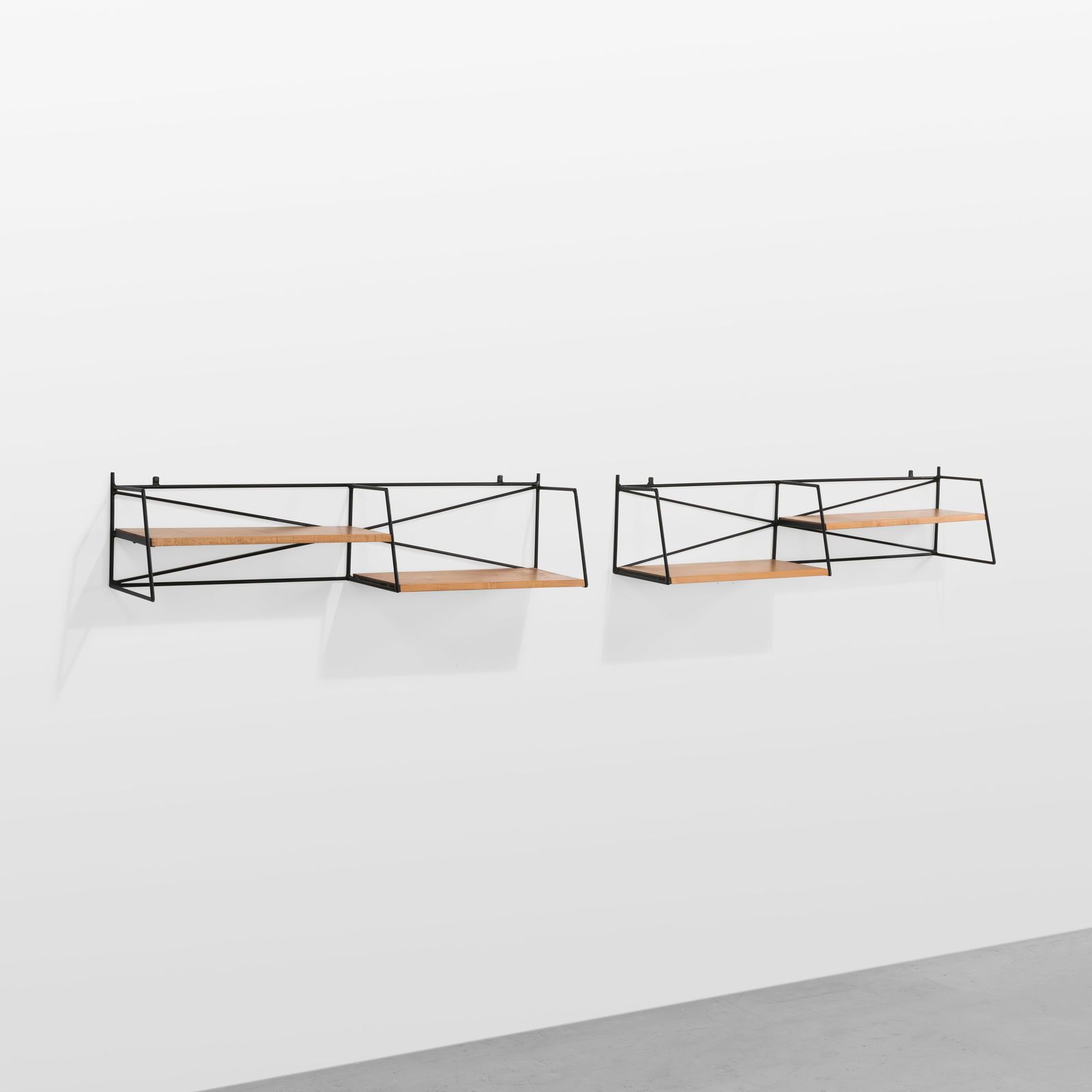 Paul McCobb - Nightstands: A pair of Paul McCobb Planner Group maple and wrought iron, wall mount nightstands.