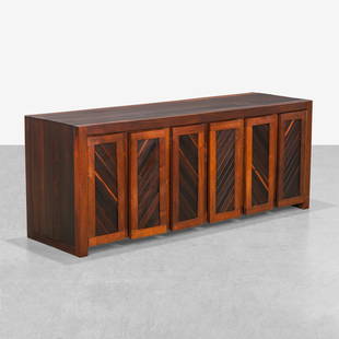 Jeffrey Greene - Credenza: A vintage credenza by Jeffrey Greene with paneled doors. Signed inside of door.