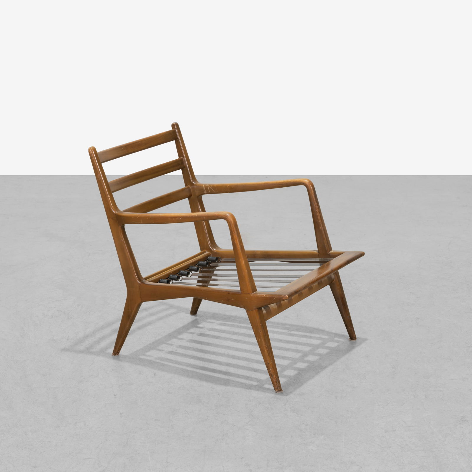 Carlo De Carli - Lounge Chair: A vintage lounge chair by Carlo De Carli for Singer and Sons. All measurements are in inches. Height x Width x Depth