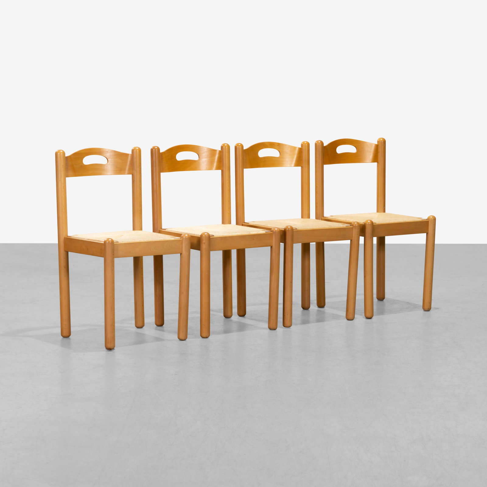 Italian Dining Chairs: A set of four Italian dining chairs with woven cord seats. All measurements are in inches. Height x Width x Depth