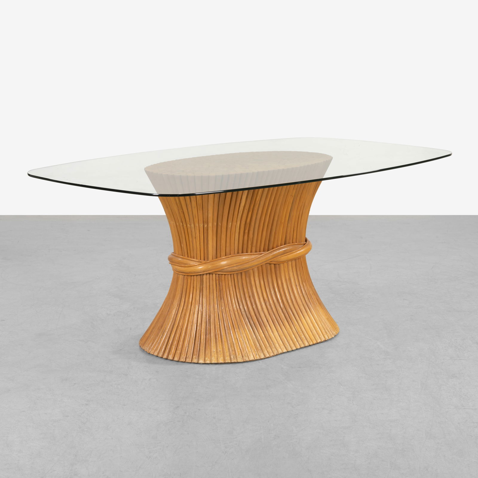 McGuire Style - Dining Table: A 'Sheaf of Wheat' style, glass top dining table in the manner of McGuire. All measurements are in inches. Height x Width x Depth