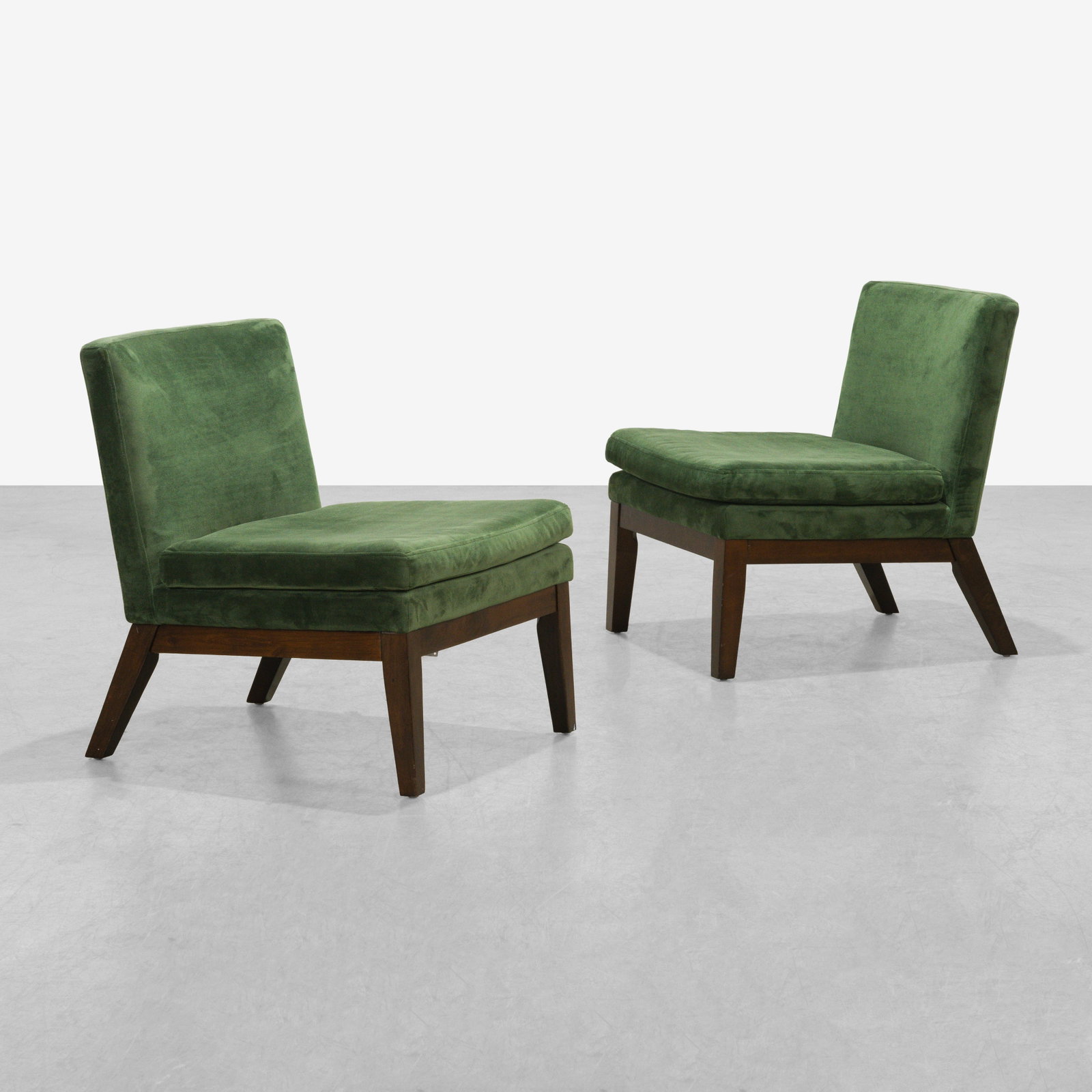 Slipper Chairs: A pair of contemporary slipper chairs by West Elm.