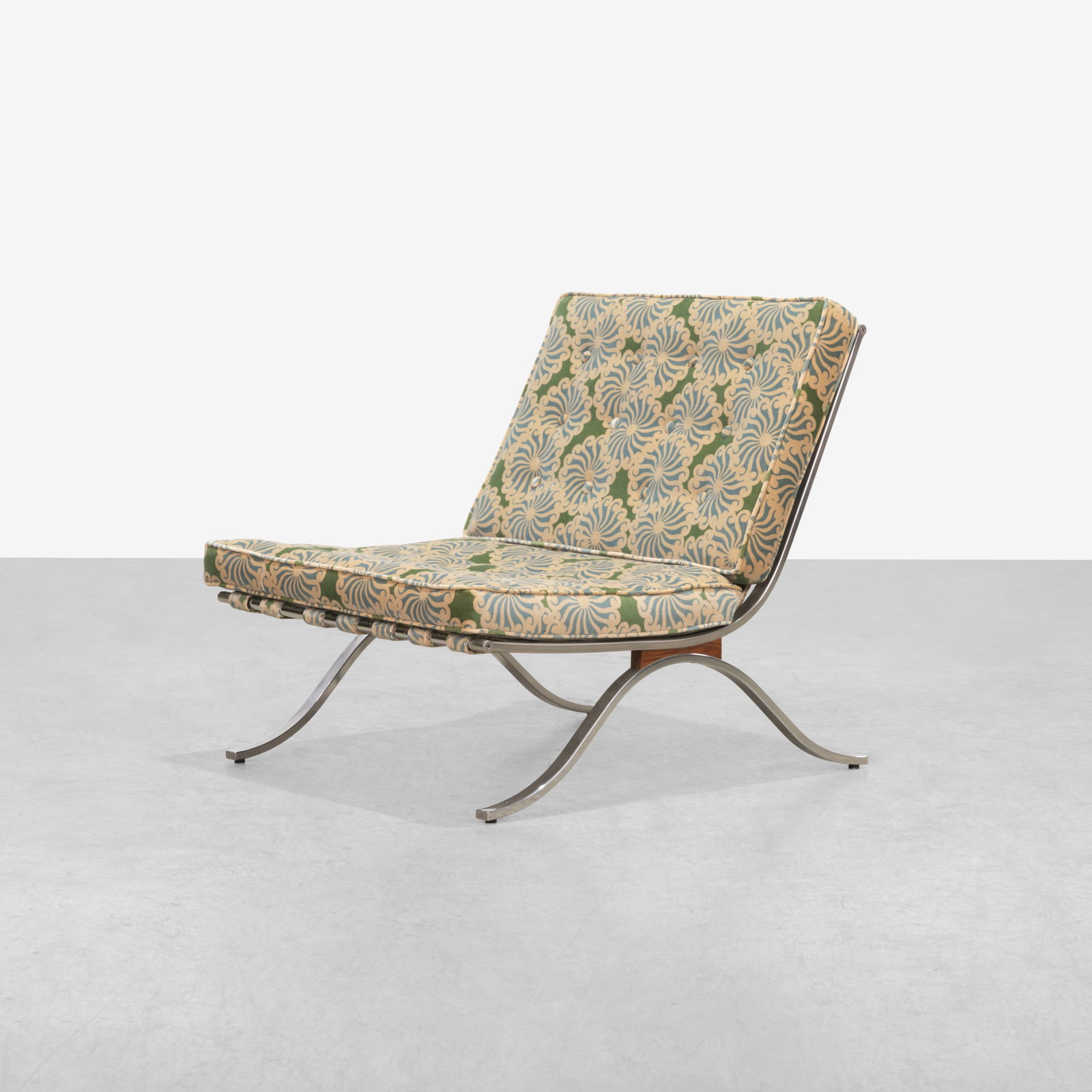 Barcelona Style Lounge Chair: A vintage lounge chair in the manner of Mies Van Der Rohe's 'Barcelona' Chair.