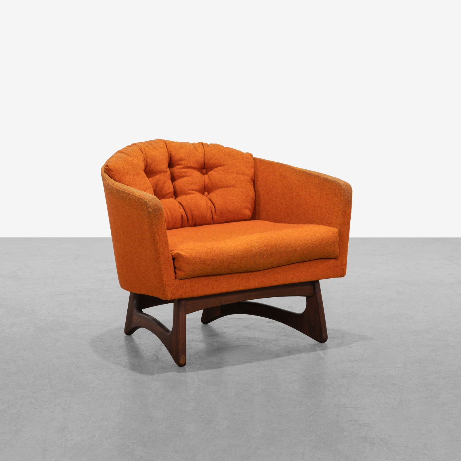 Adrian Pearsall - Lounge Chair: A vintage lounge chair with walnut legs by Adrian Pearsall for Craft Associates. All measurements are in inches. Height x Width x Depth