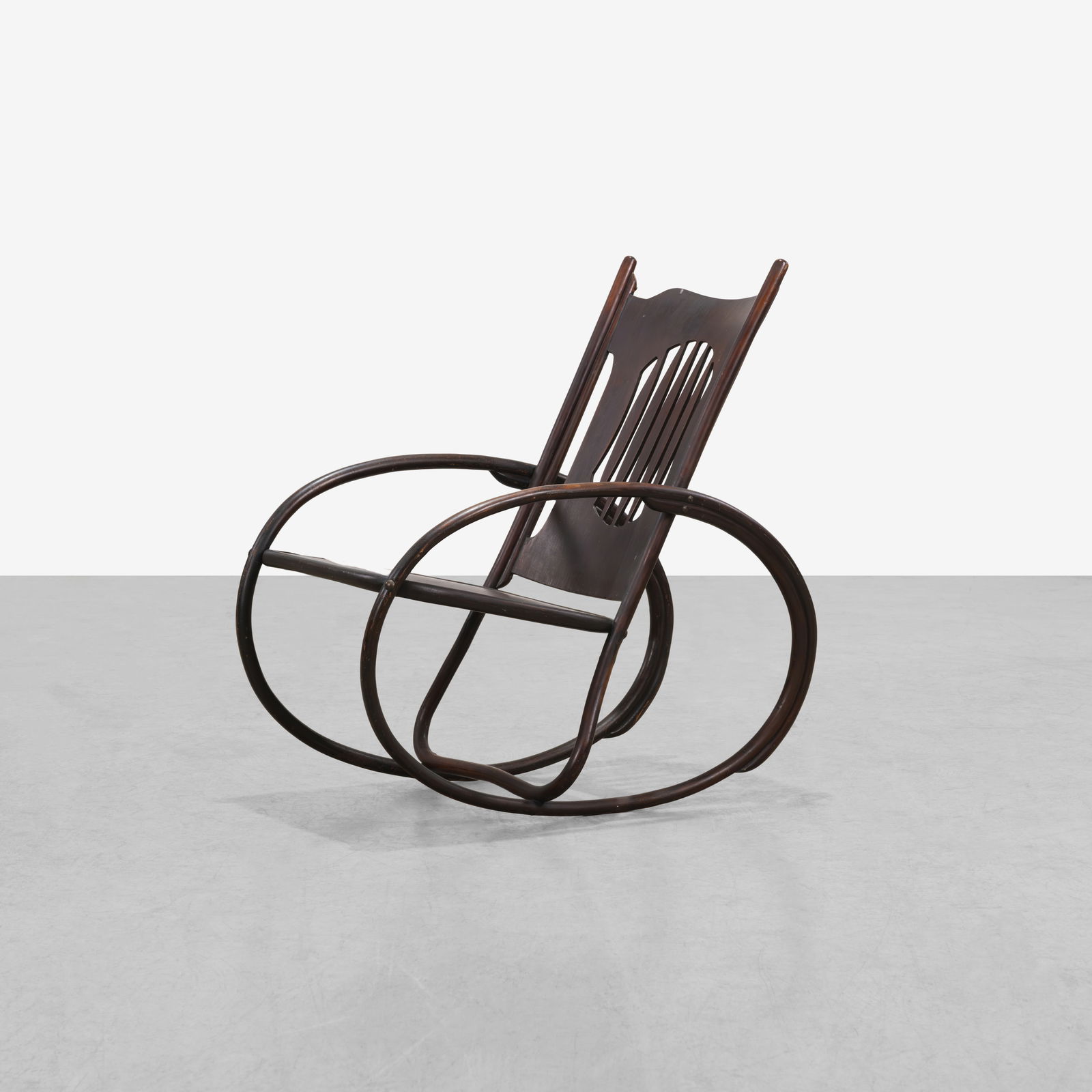 Jacob & Josef Kohn - Rocking Chair: A bent wood rocking chair by Jacob and Josef Kohn. All measurements are in inches. Height x Width x Depth