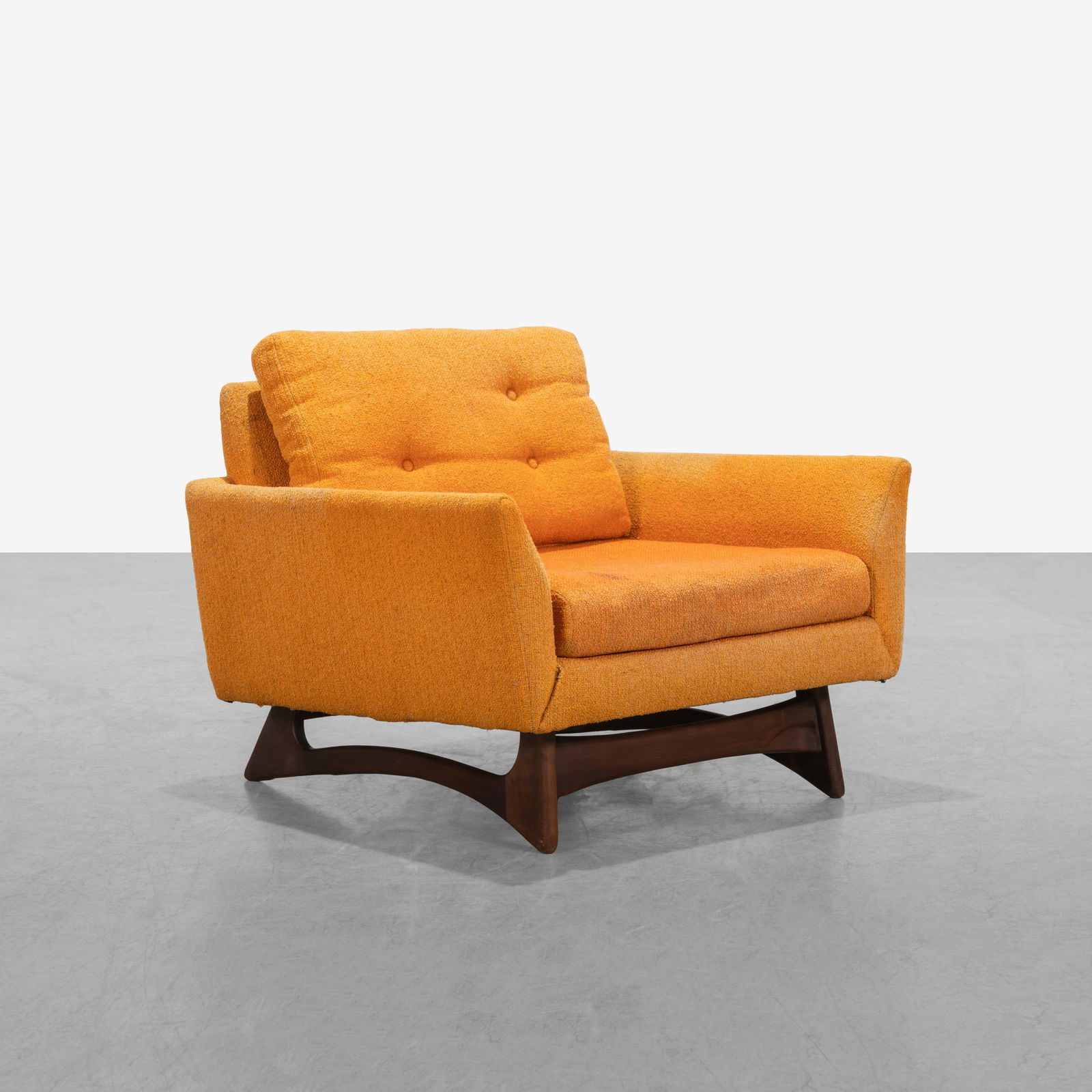 Adrian Pearsall (After) - Lounge Chair: A vintage lounge chairs with walnut legs in the manner of Adrian Pearsall by Flexsteel. All measurements are in inches. Height x Width x Depth