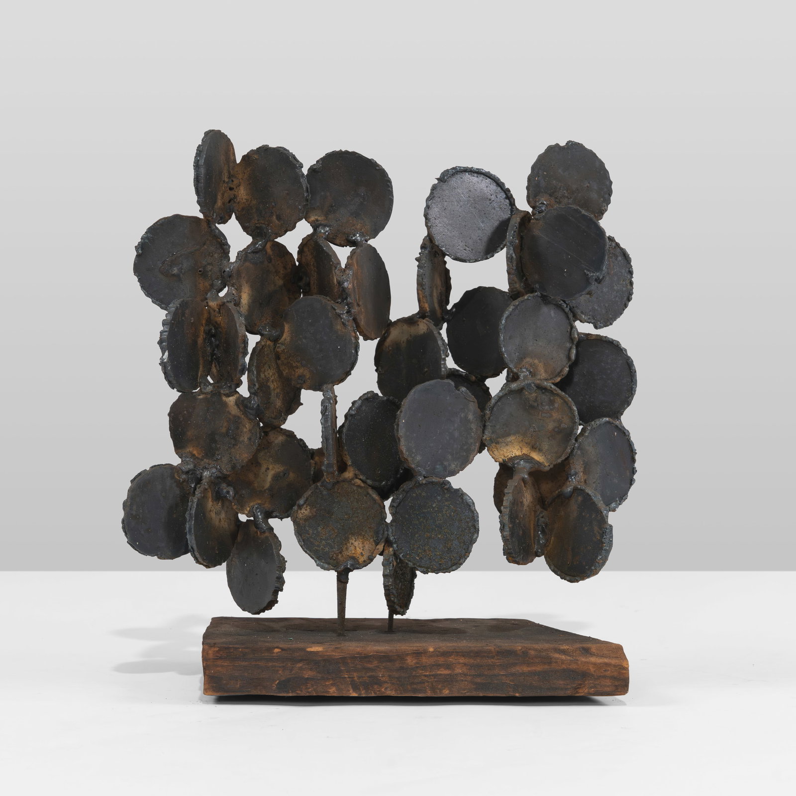 Iron Sculpture: A vintage steel sculpture in the manner of Harry Bertoia. All measurements are in inches. Height x Width x Depth