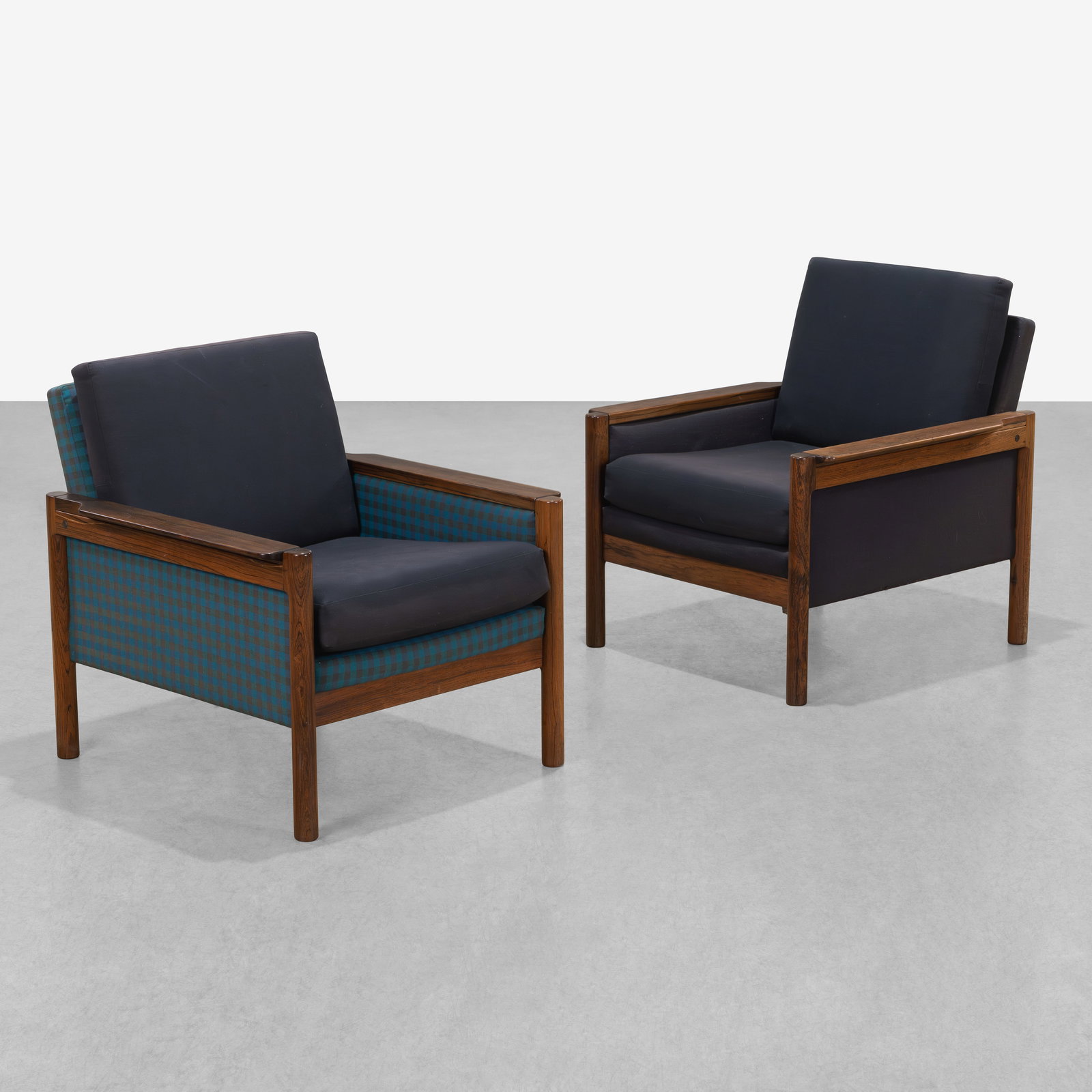 Danish Rosewood Club Chairs: A pair of Danish rosewood club chairs by Slagelse Mobelvaerk. Lacking labels. All measurements are in inches. Height x Width x Depth