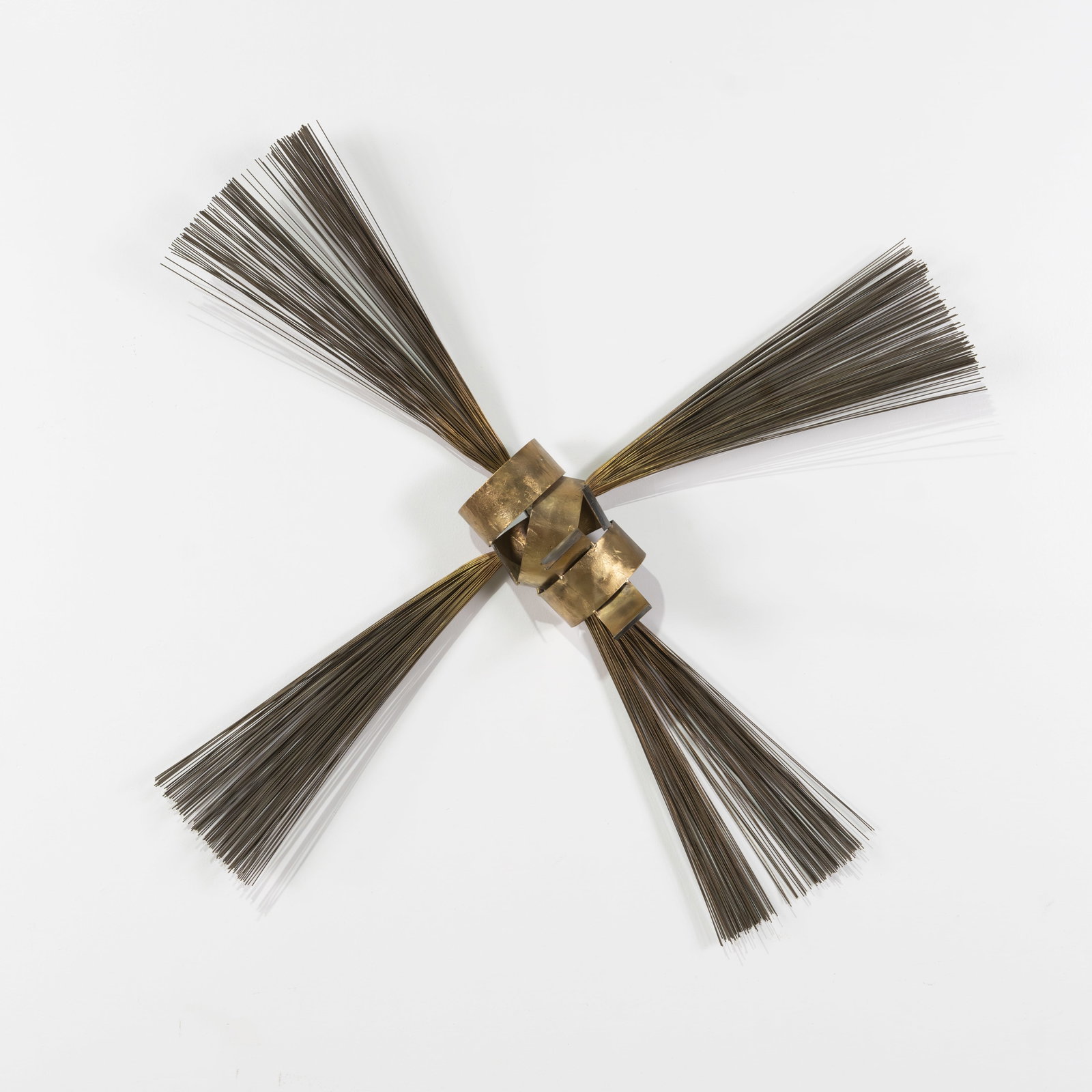 Brutalist Wall Sculpture: A brutalist style, metal wall sculpture. Unmarked. All measurements are in inches. Height x Width x Depth
