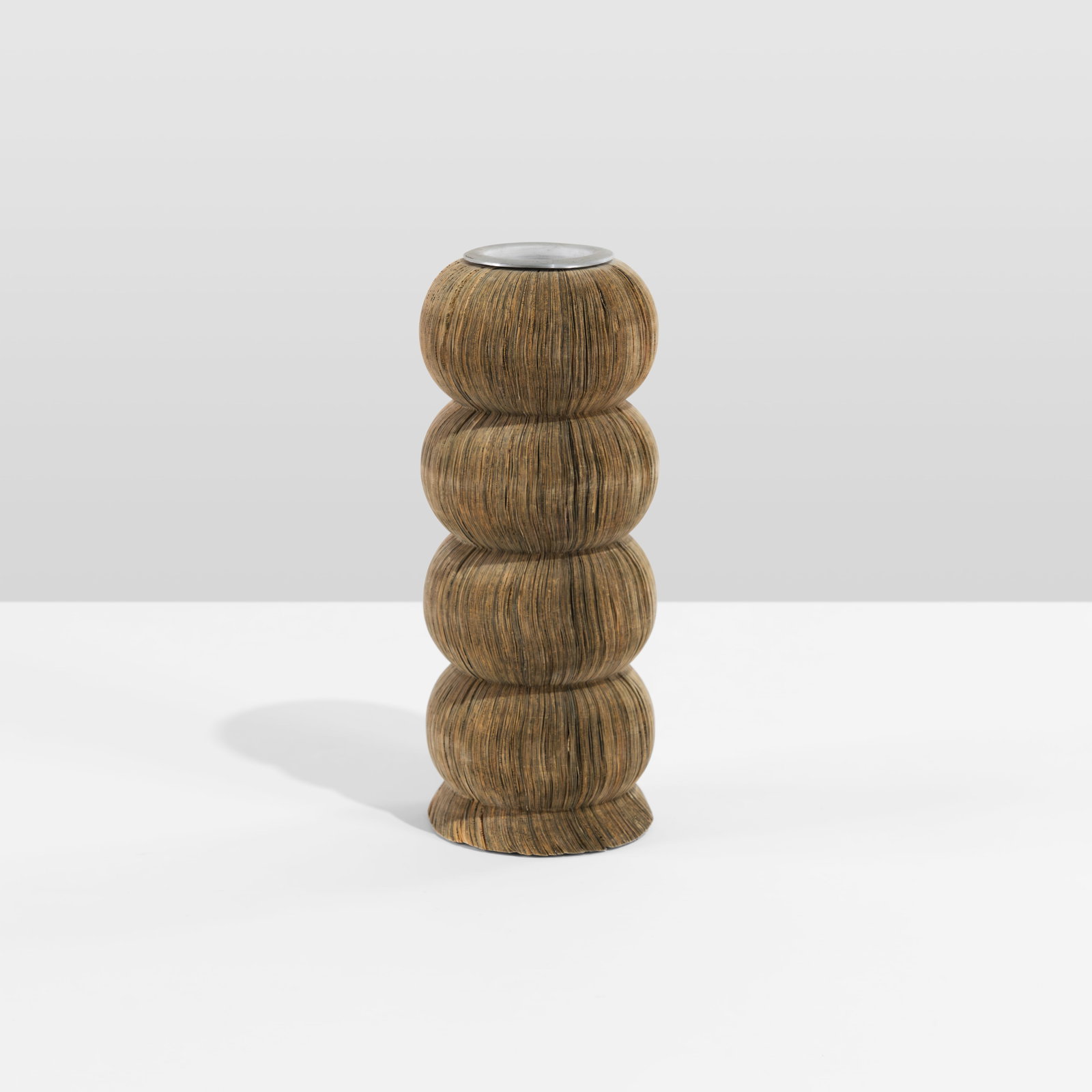 Unusual Magazine Vase: A very unique vase made out of cut magazine pages and a machined aluminum center. All measurements are in inches. Height x Width x Depth