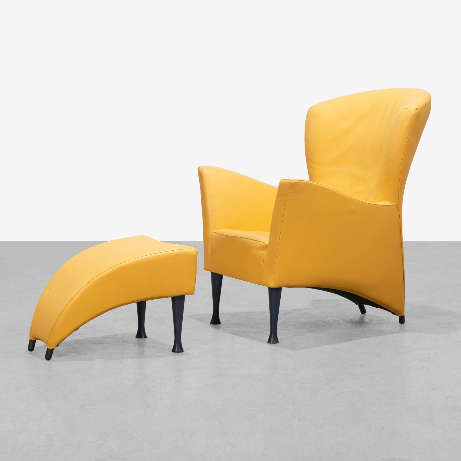 Gijs Papavoine - Chair & Ottoman: A yellow leather and blue stained wood lounge chair and ottoman by Gijs Papavoine for Montis. All measurements are in inches. Height x Width x Depth