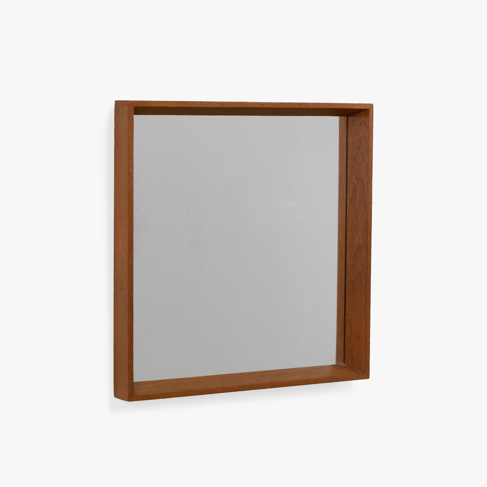 Teak Mirror: A vintage teak mirror. All measurements are in inches. Height x Width x Depth