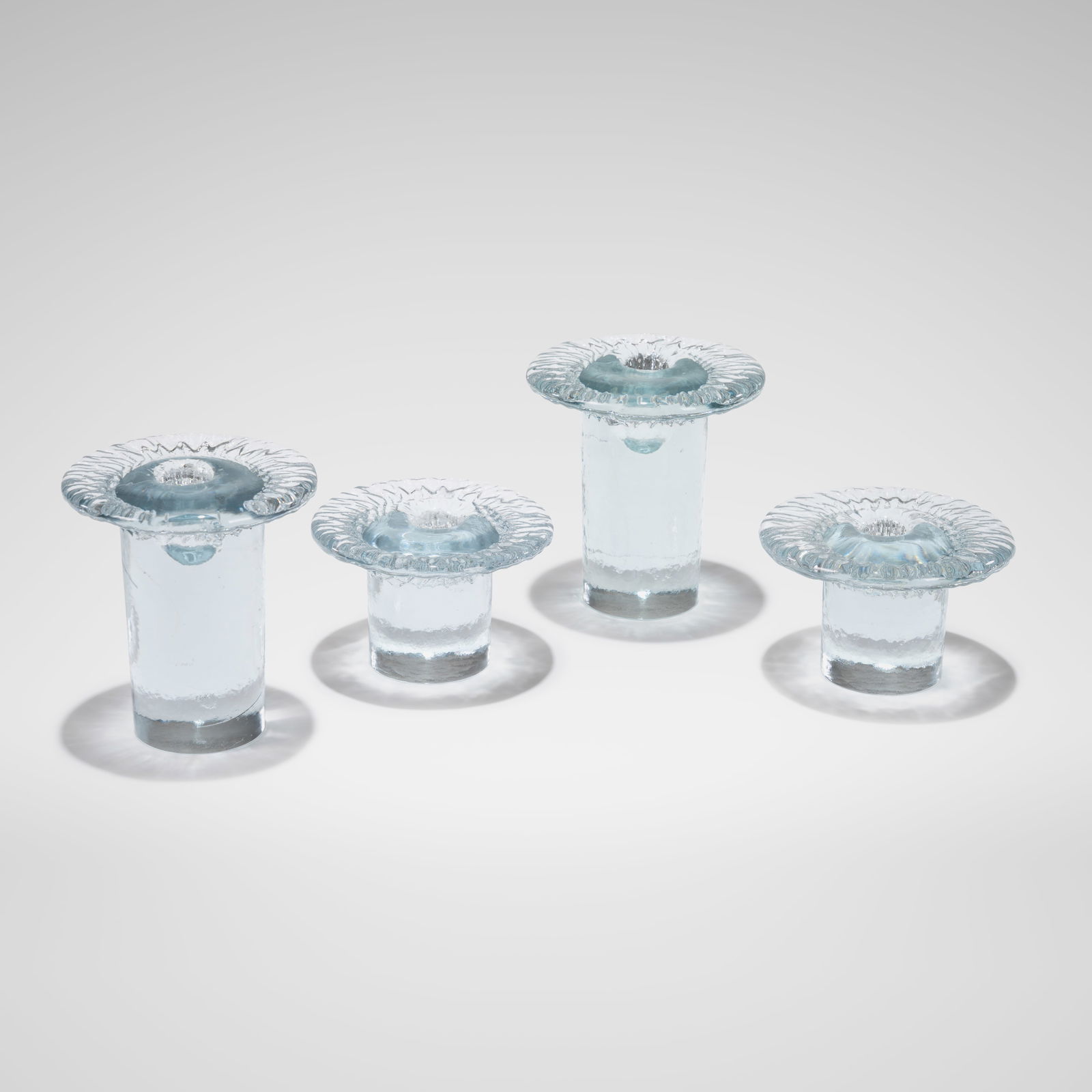 Timo Sarpaneva - Candle Holders: A set of four glass candle holders by Timo Sarpaneva, Finland. Small - 3 x 5 x 5. All measurements are in inches. Height x Width x Depth