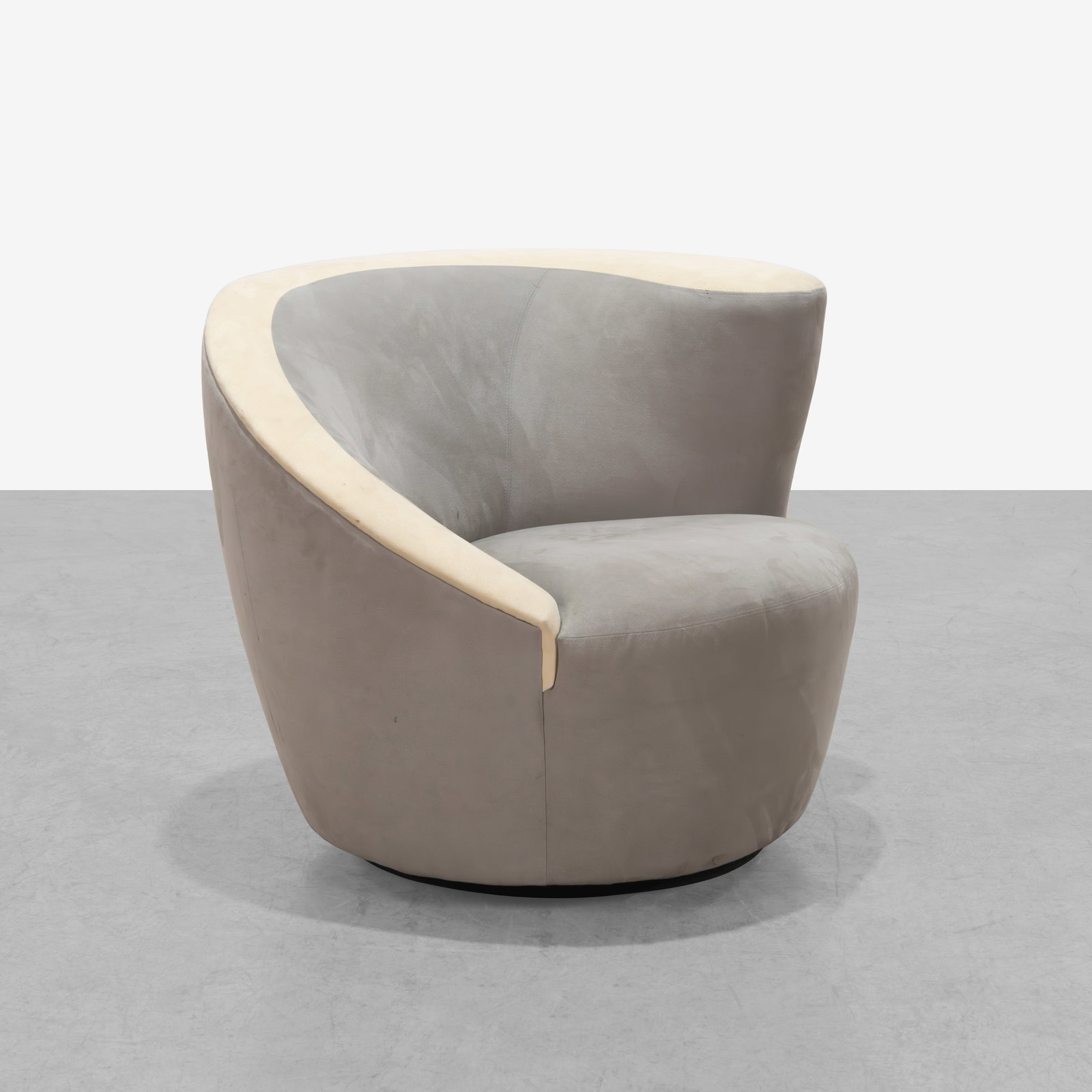 Vladimir Kagan (Attr.) - Nautilus Chair: A suede 'Nautilus' swivel chair, attributed to Vladimir Kagan. Unmarked. All measurements are in inches. Height x Width x Depth