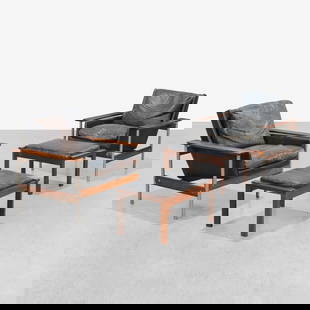 Sven Ivar Dysthe - Rosewood Lounge Chairs: A pair of rosewood and leather lounge chairs with ottomans by Sven Ivar Dysthe for Dokka, Norway. All measurements are in inches. Height x Width x Depth