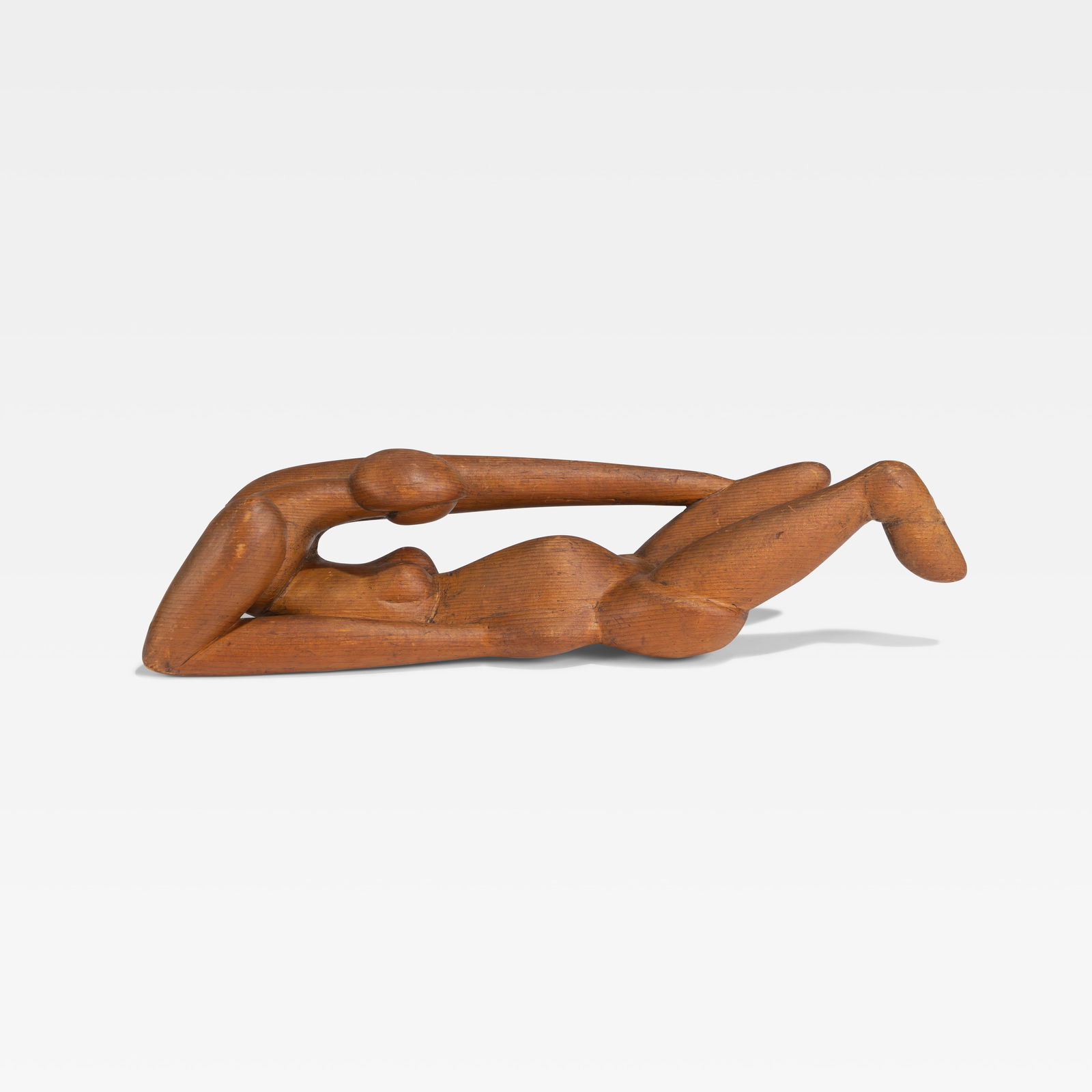 Figural Pine Sculpture: A figural pine sculpture of a nude woman. Unsigned. All measurements are in inches. Height x Width x Depth