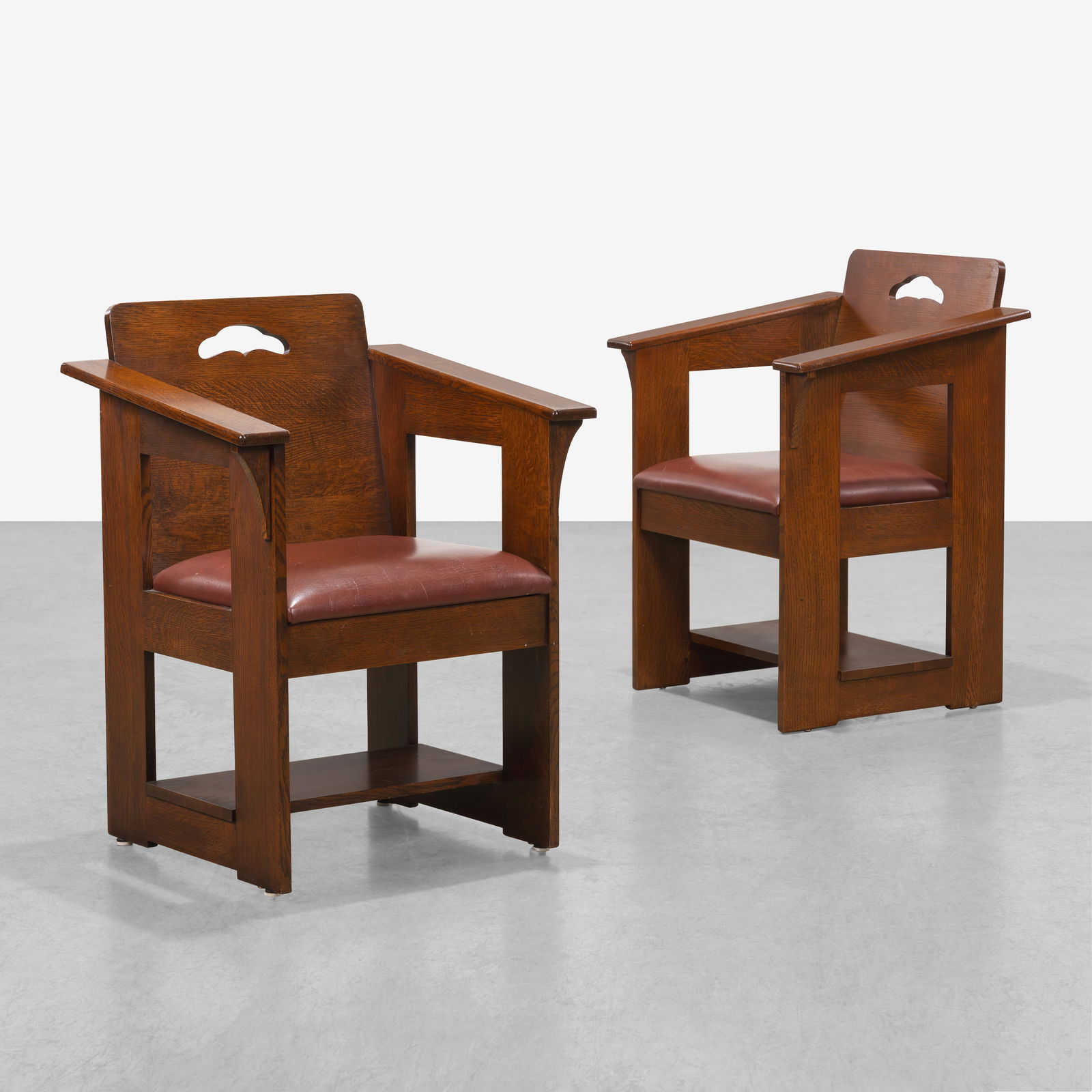 Stickley - Limbert Cafe Chairs: A pair of oak 'Cafe' chairs, designed by Charles Limbert and produced by Stickley Furniture All measurements are in inches. Height x Width x Depth