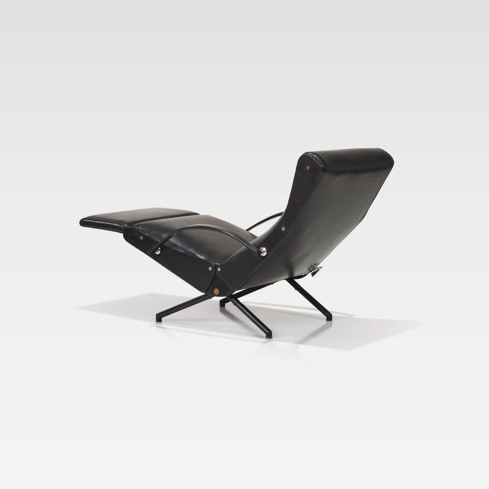 Osvaldo Borsani - P40 Lounge Chair: A vintage 'P40' adjustable lounge chair by Osvaldo Borsani for Tecno, Italy. Dimensions reflect the chair with the chrome footrest extended and the backrest slightly reclined in a lounge position. All