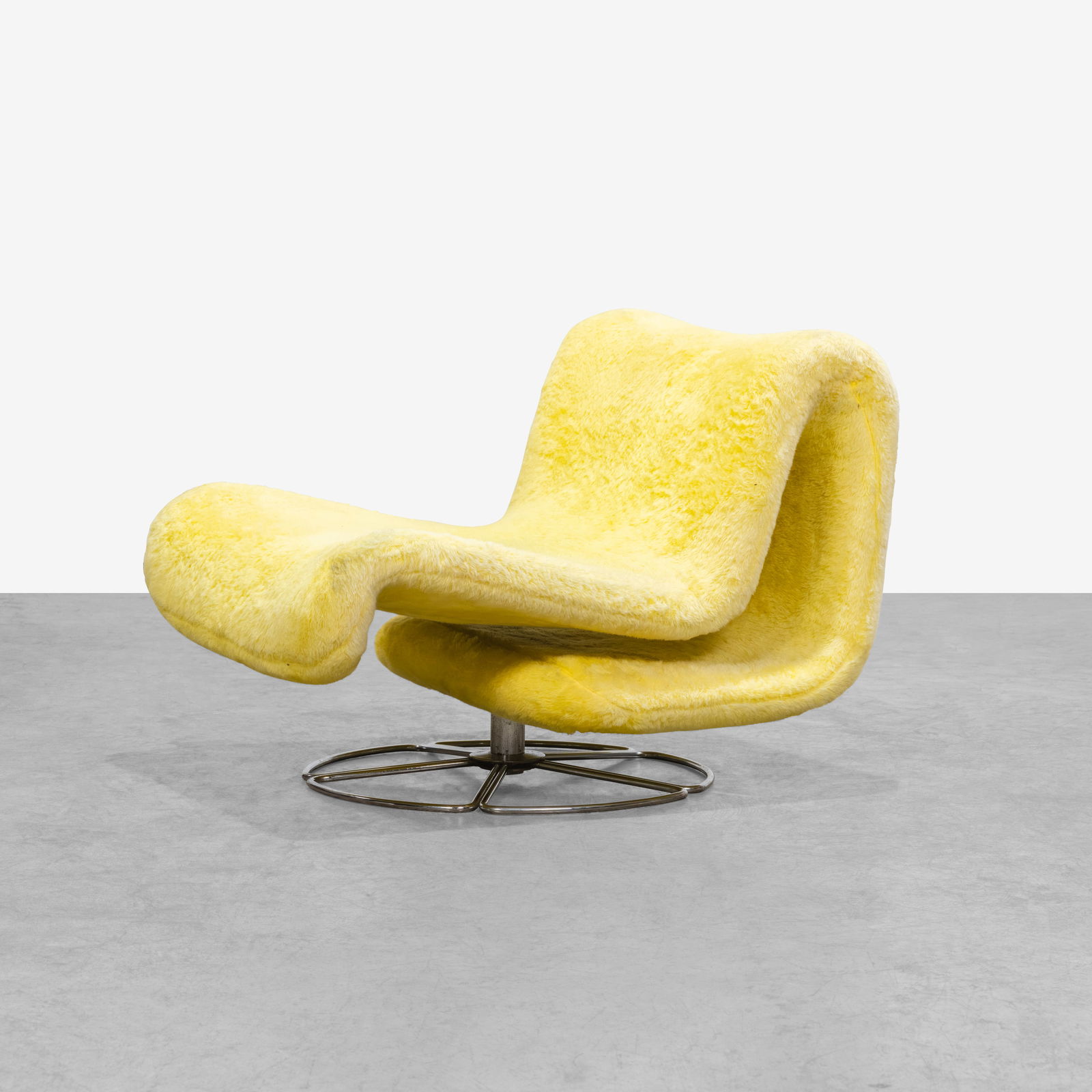 Pierre Paulin (After) - Lounge Chair: A swiveling lounge chair in the manner of Pierre Paulin. All measurements are Height x Width x Depth.