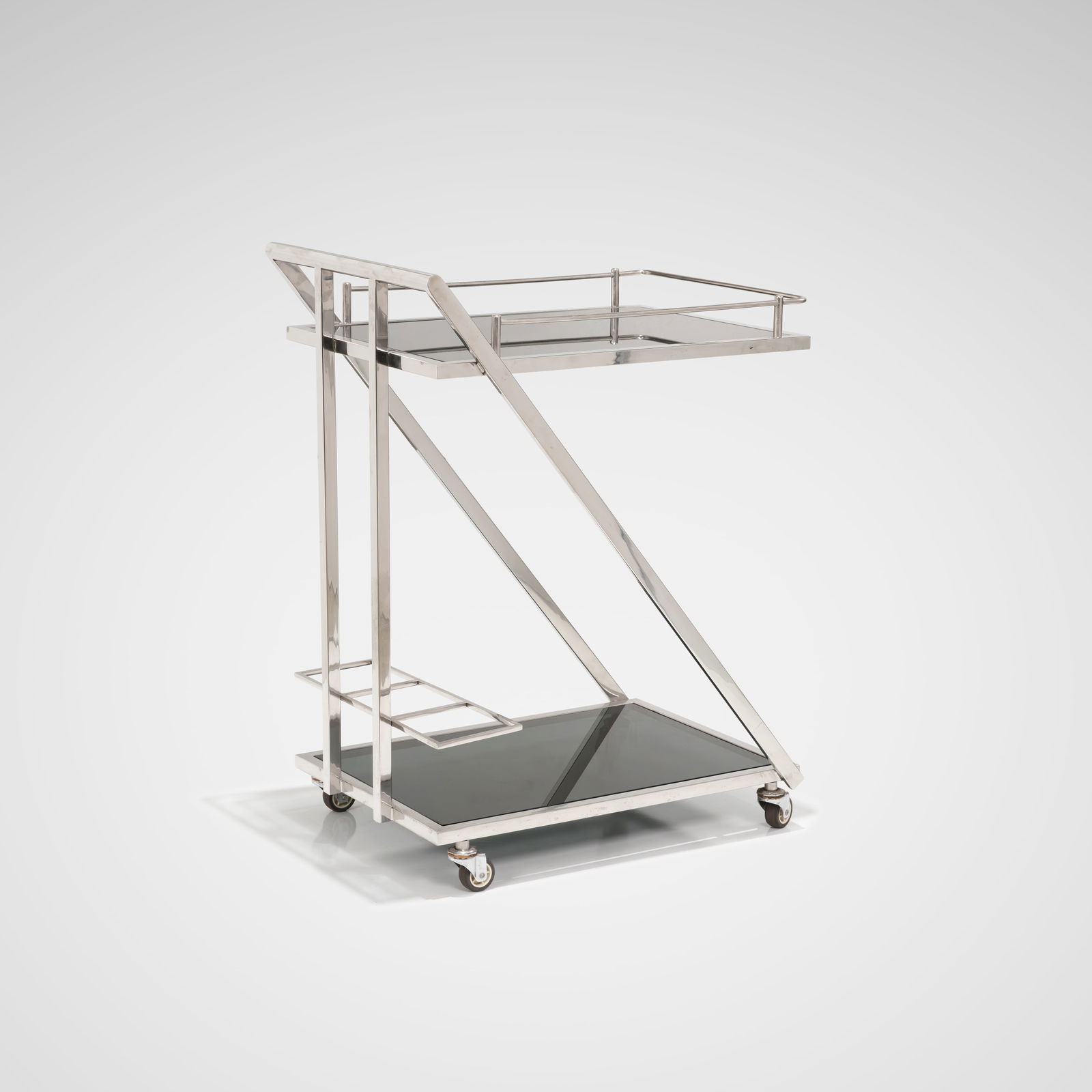 Modernist Serving Cart: A nickel-plated and glass serving cart. All measurements are Height x Width x Depth.