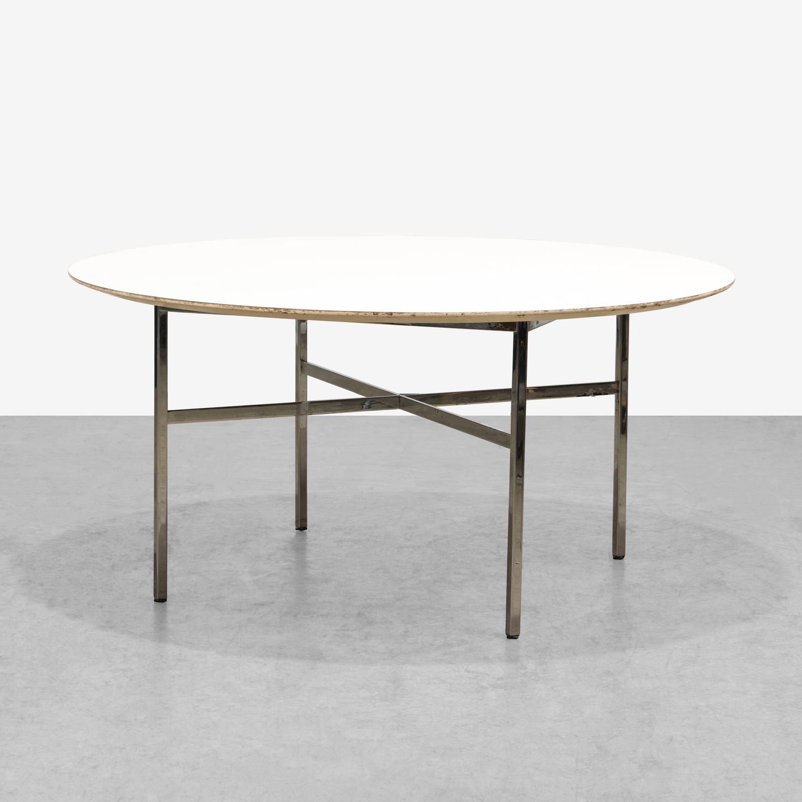 Florence Knoll - Conference Table: A large, round conference table by Florence Knoll. All measurements are Height x Width x Depth.