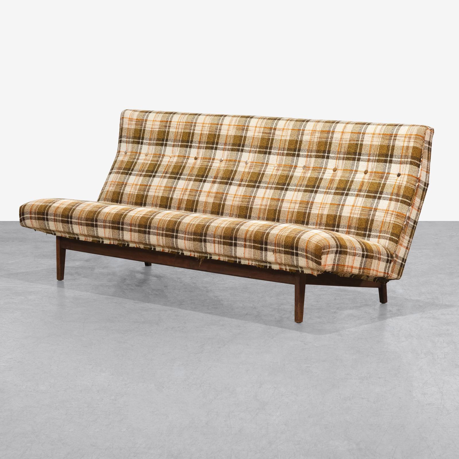 Jens Risom - Sofa: A sofa with walnut frame by Jens Risom. All measurements are Height x Width x Depth.