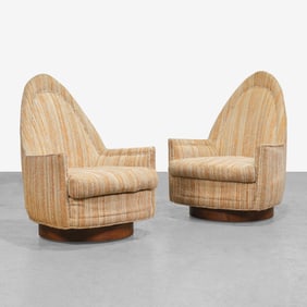 Swiveling Club Chairs