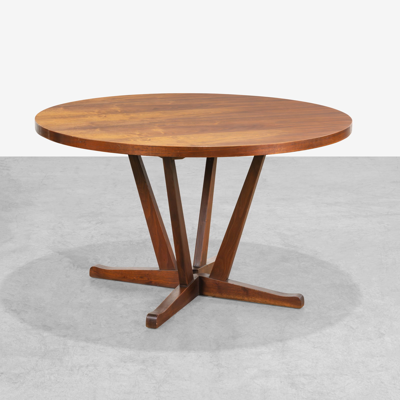 Chet Beardsley - Dining Table: A walnut dining table by Chet Beardsley. Accepts a leaf but does not have one. All measurements are Height x Width x Depth.