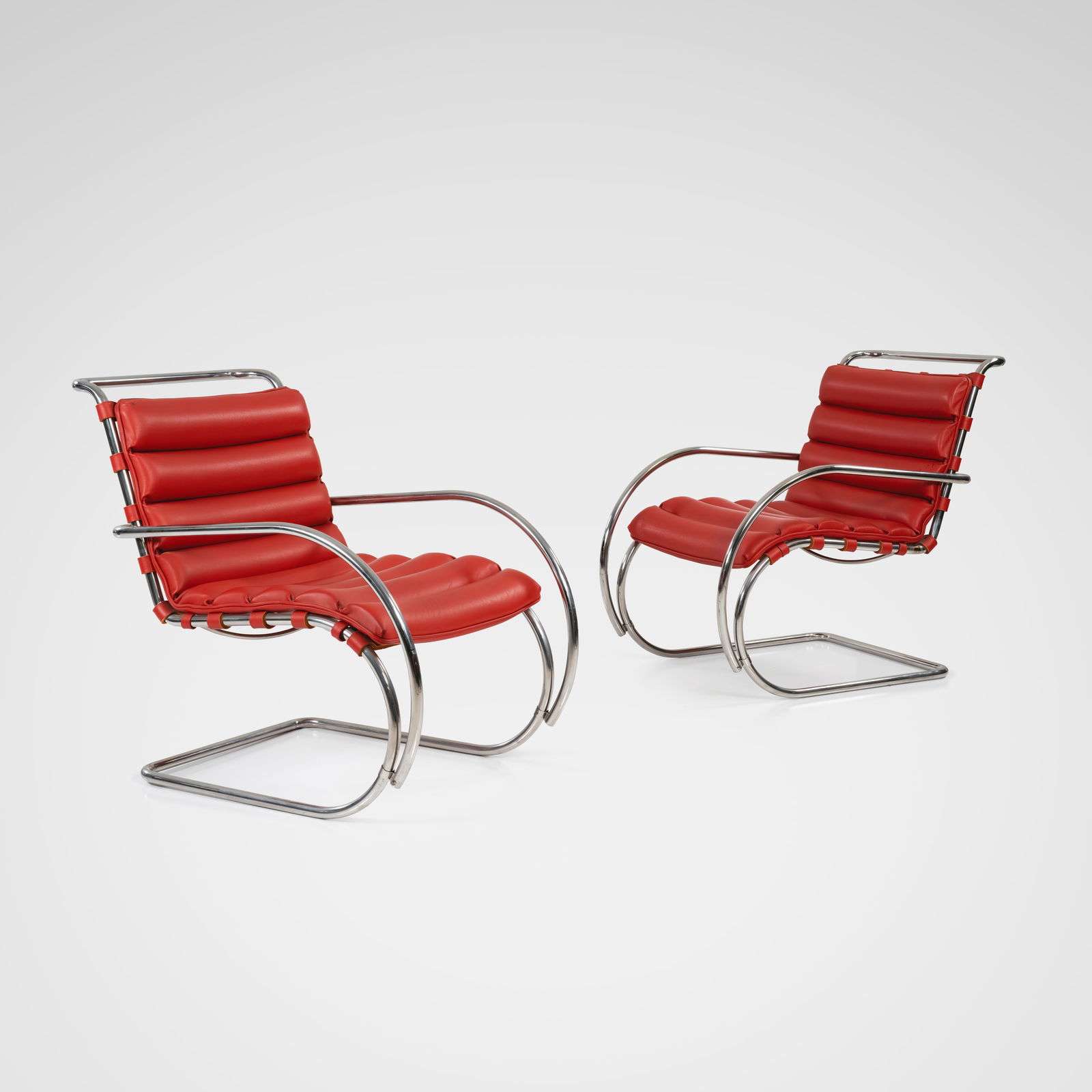 Mies Van Der Rohe - Lounge Chairs: A pair of red leather 'MR EO7M' lounge chairs by Mies Van Der Rohe for Knoll Studio. All measurements are in inches. Height x Width x Depth